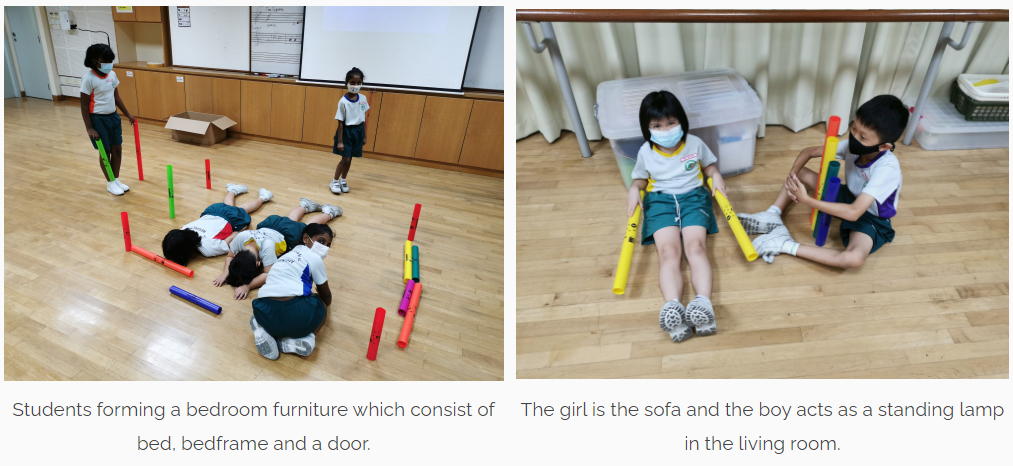 Children using colorful foam tubes to act out furniture, forming a bed and door scene, while two kids pose as sofa and lamp.