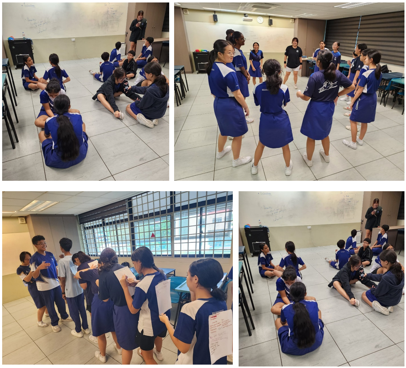 Students in blue uniforms participate in various classroom activities, sitting on floors, standing in groups, and reviewing papers.