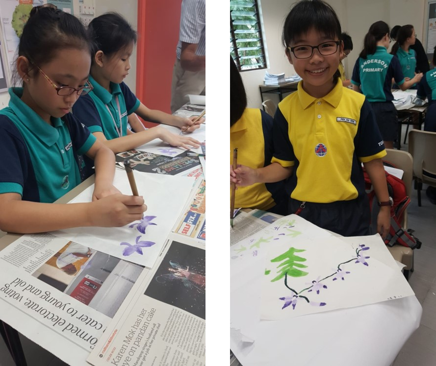Two schoolgirls paint purple flowers; another student smiles holding a brush beside a floral painting.