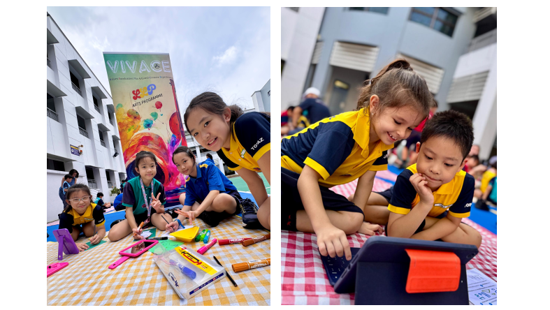 Children in yellow and navy uniforms sit outdoors at a school event, drawing with markers and using a tablet.