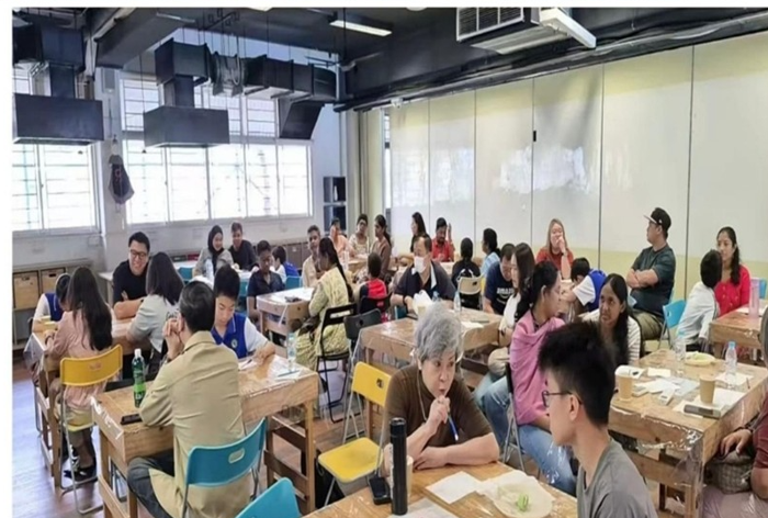 Parents taking part in a group activity during the Find Your Shine, Boost Your Self-Esteem workshop.