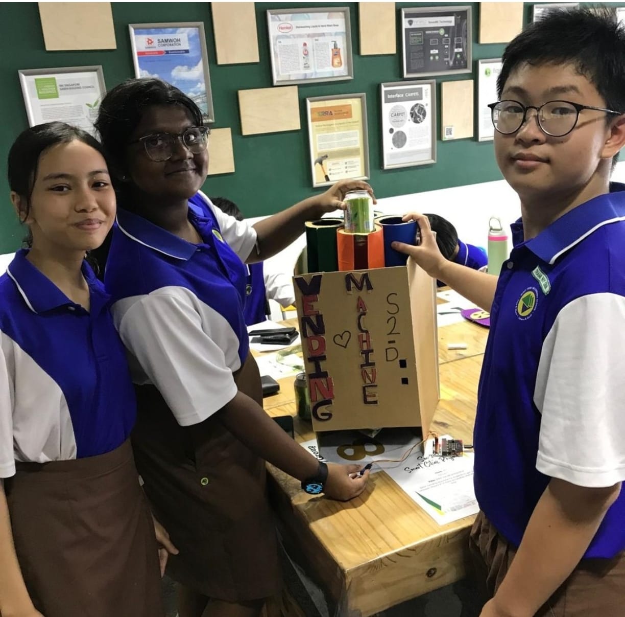 Students presenting their project prototype during a hands-on learning activity.
