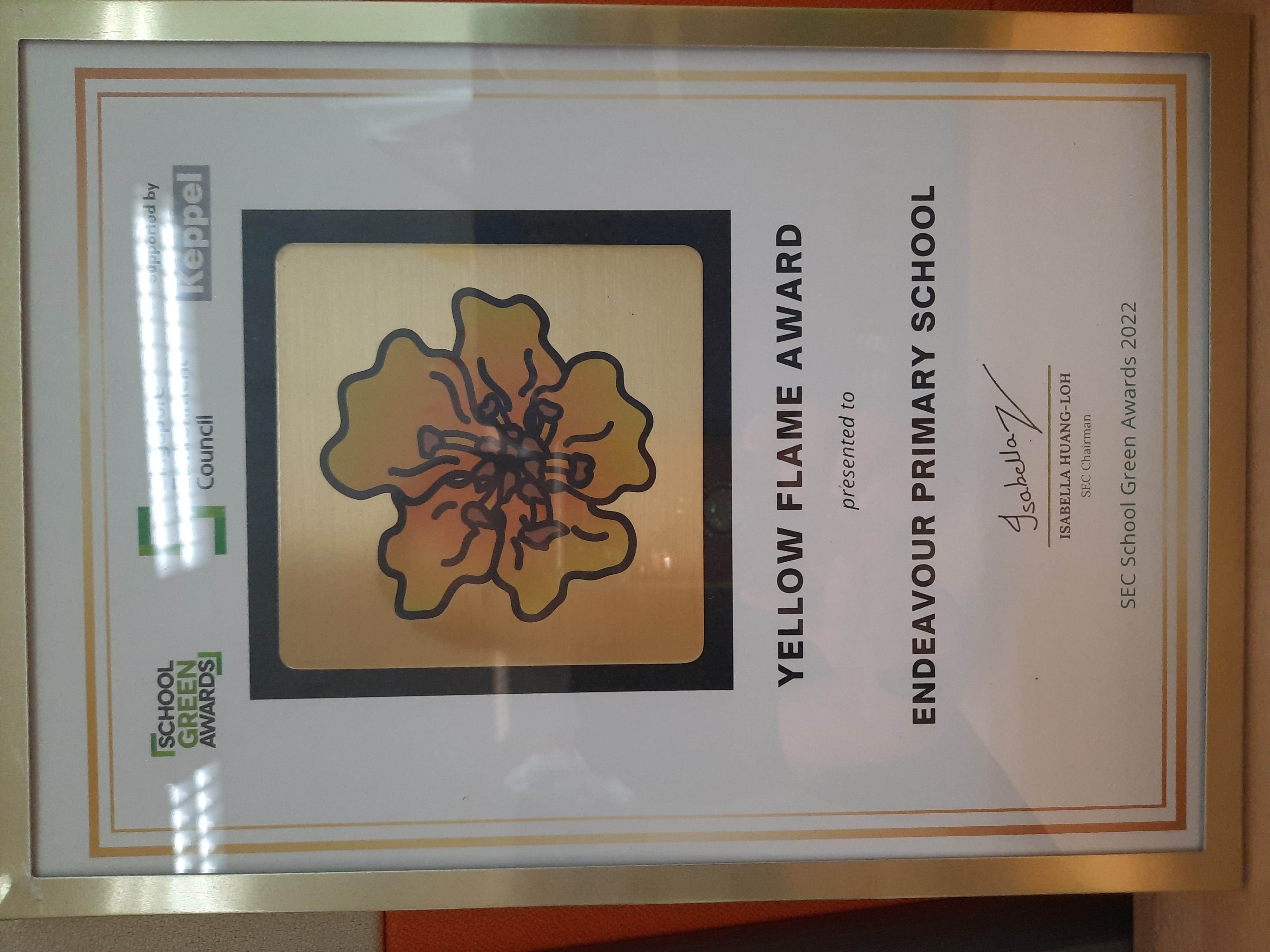 Framed Yellow Flame Award certificate presented to Endeavour Primary School at SEC School Green Awards 2022.