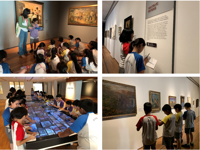 Children on a museum field trip viewing paintings, taking notes, and using an interactive digital table.