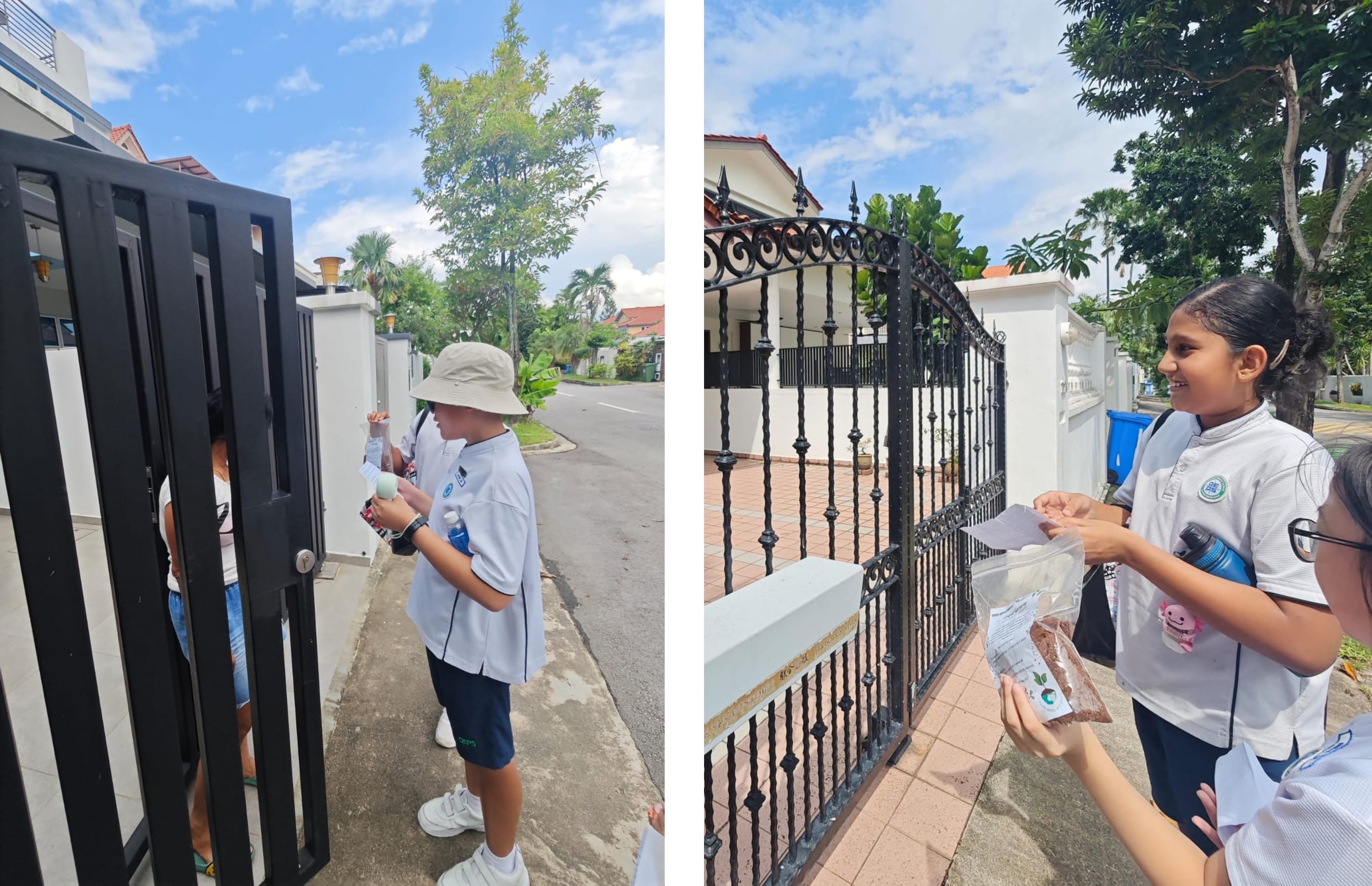 Two school children in white uniforms stand at residential gates, one holding a small bag of soil or seeds.