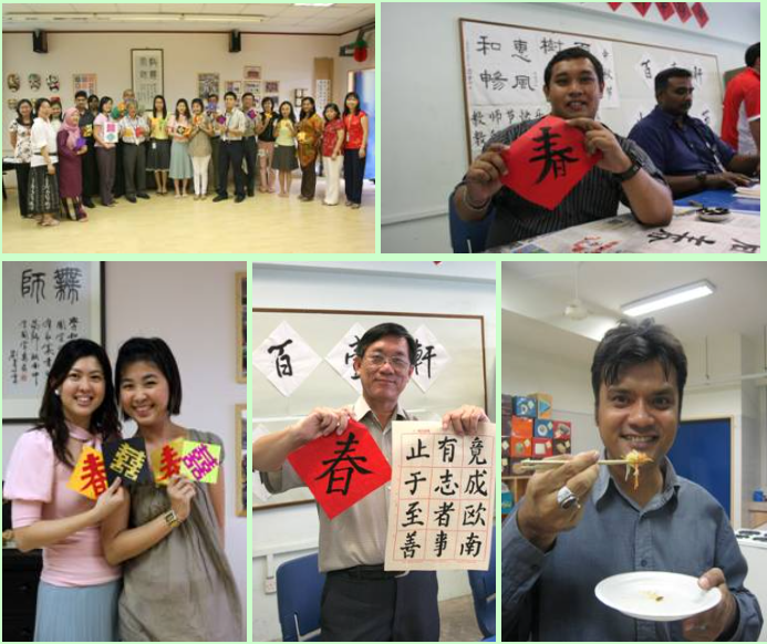People at a Chinese cultural event holding red cards with the character for spring and calligraphy scrolls.