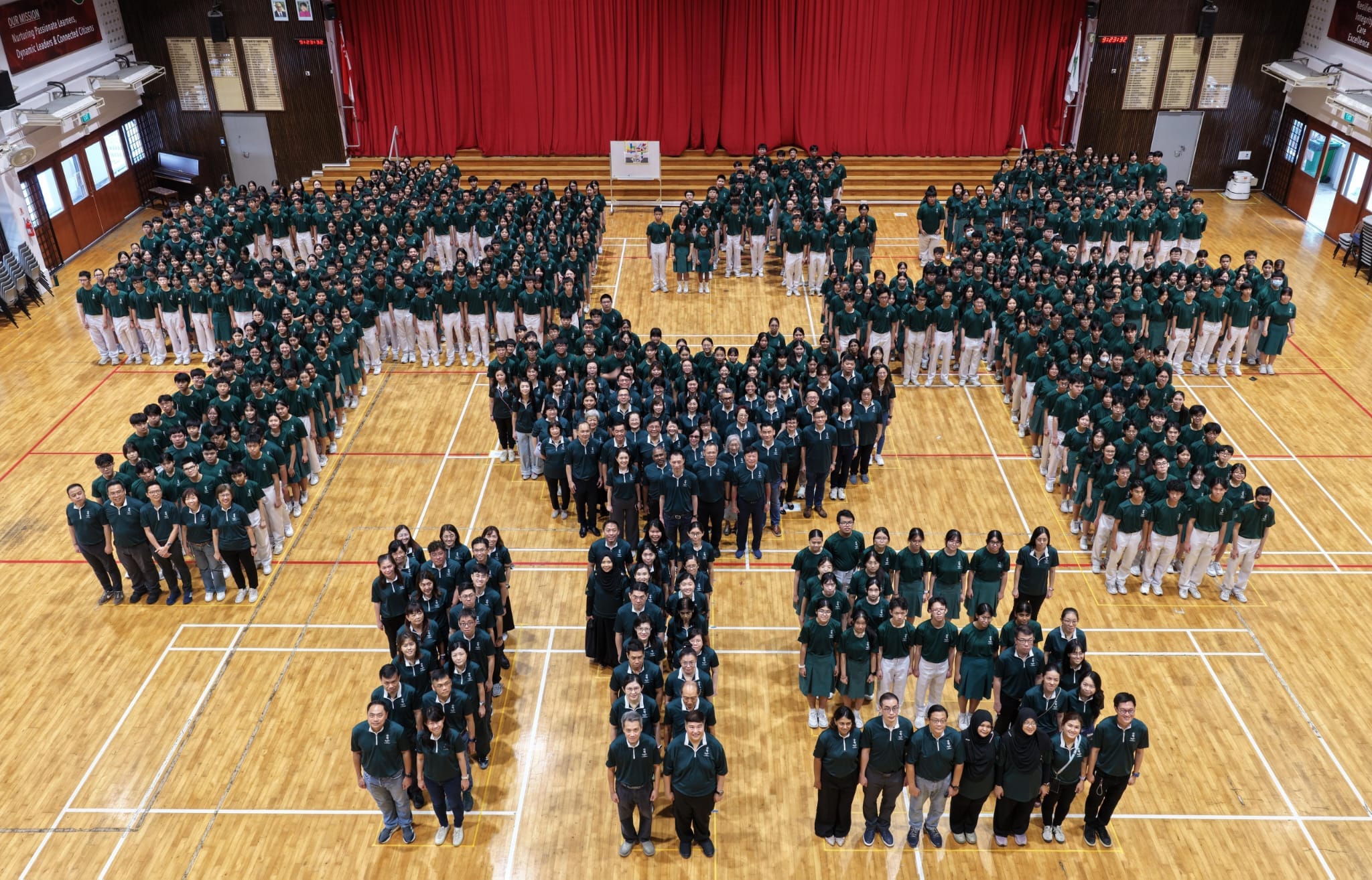 Zhss anniversary human formation photo showing zhonghua words in chinese and link to click to highlights.